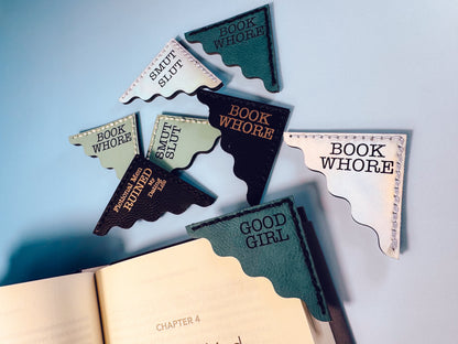 Set of decorative bookends with text on a light blue background